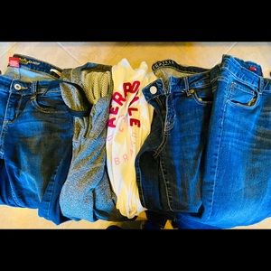 Multiple clothes( Jeans, t shirt, and sweater)